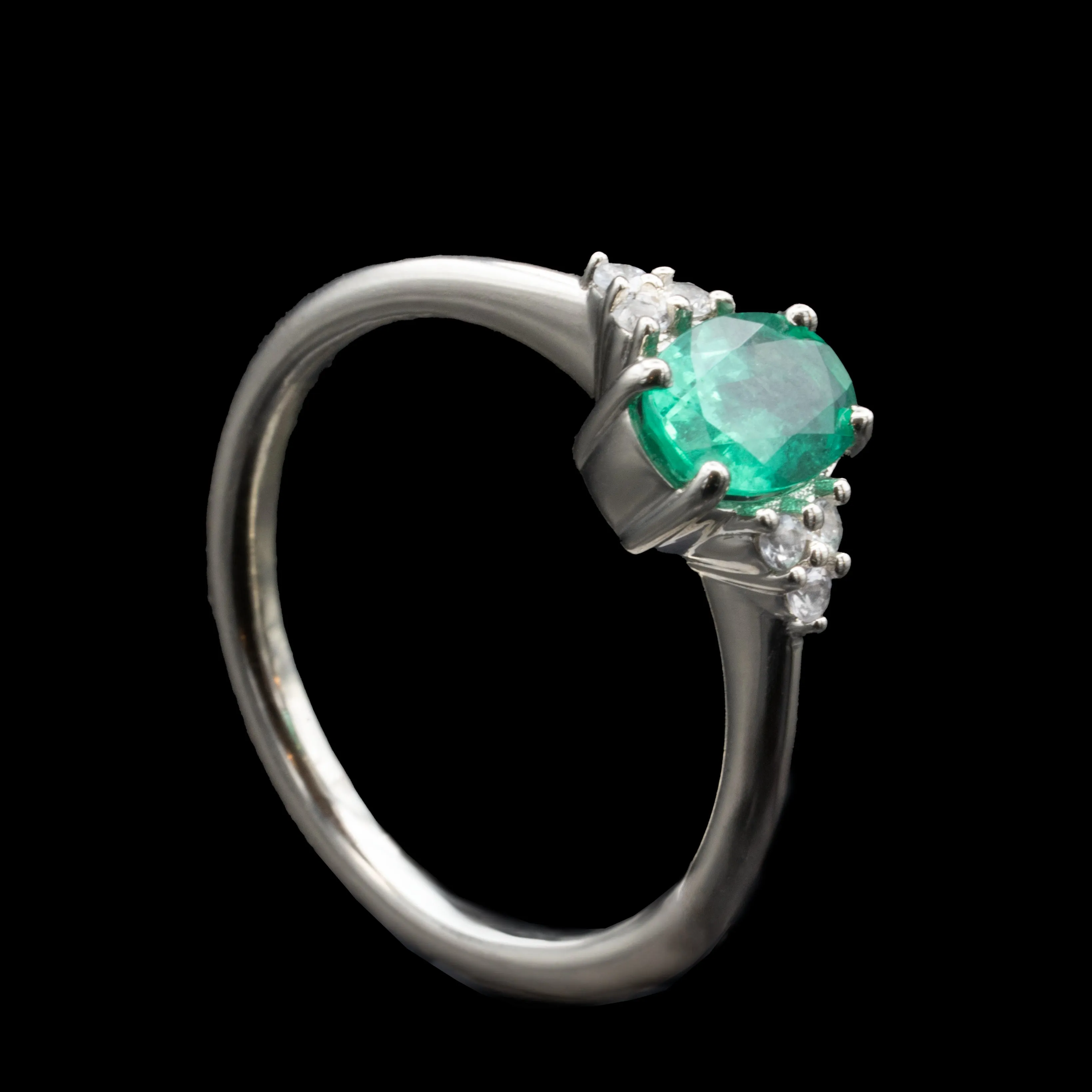 Emerald Engagement Ring With Side Stones