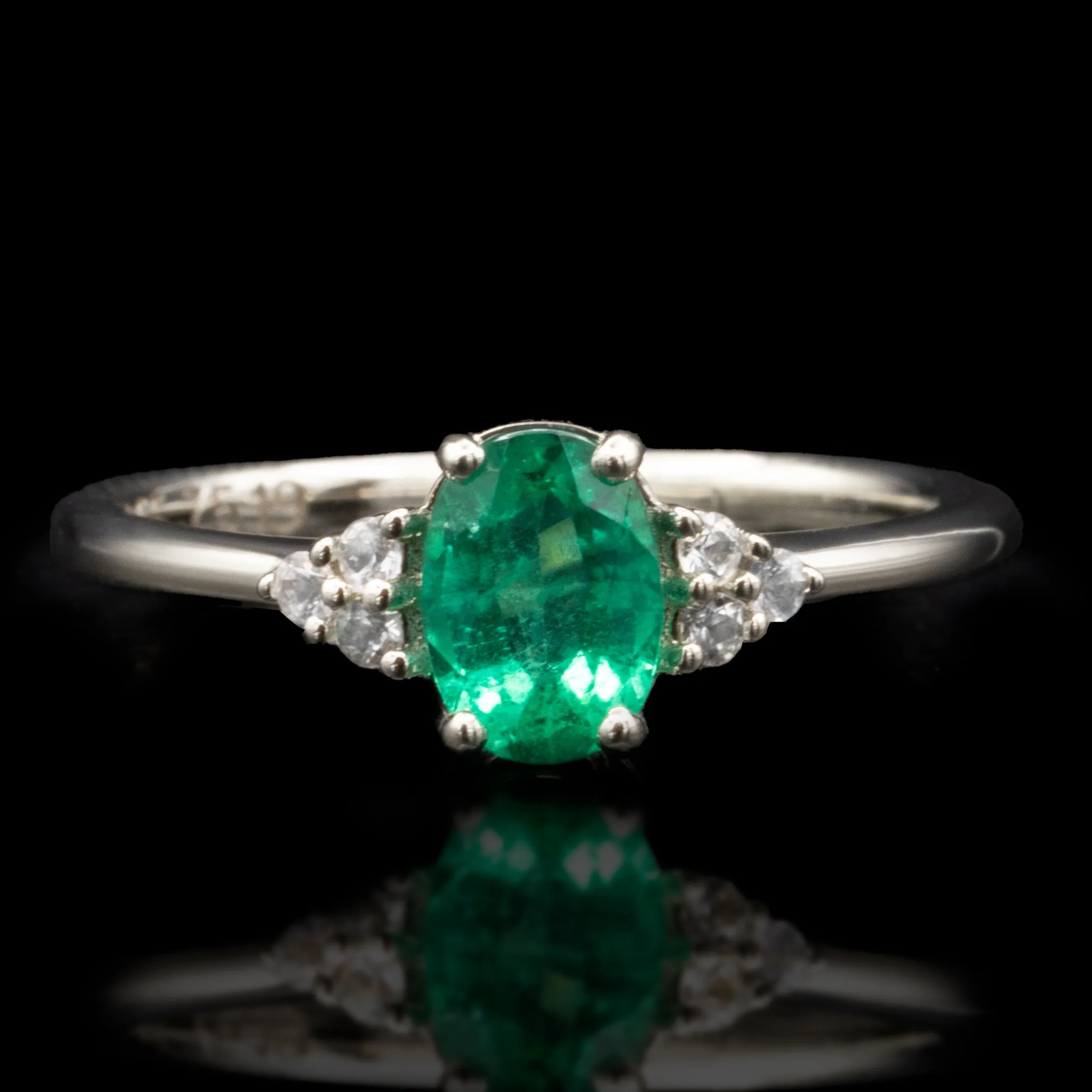 Emerald Engagement Ring With Side Stones