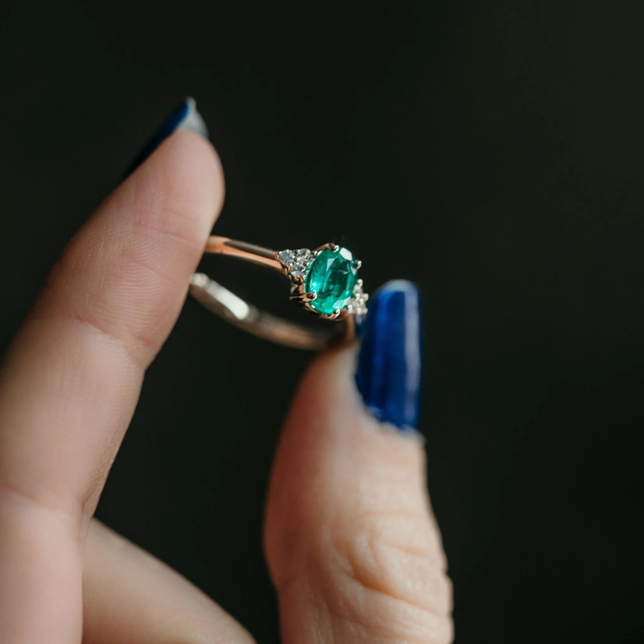 Emerald Engagement Ring With Side Stones