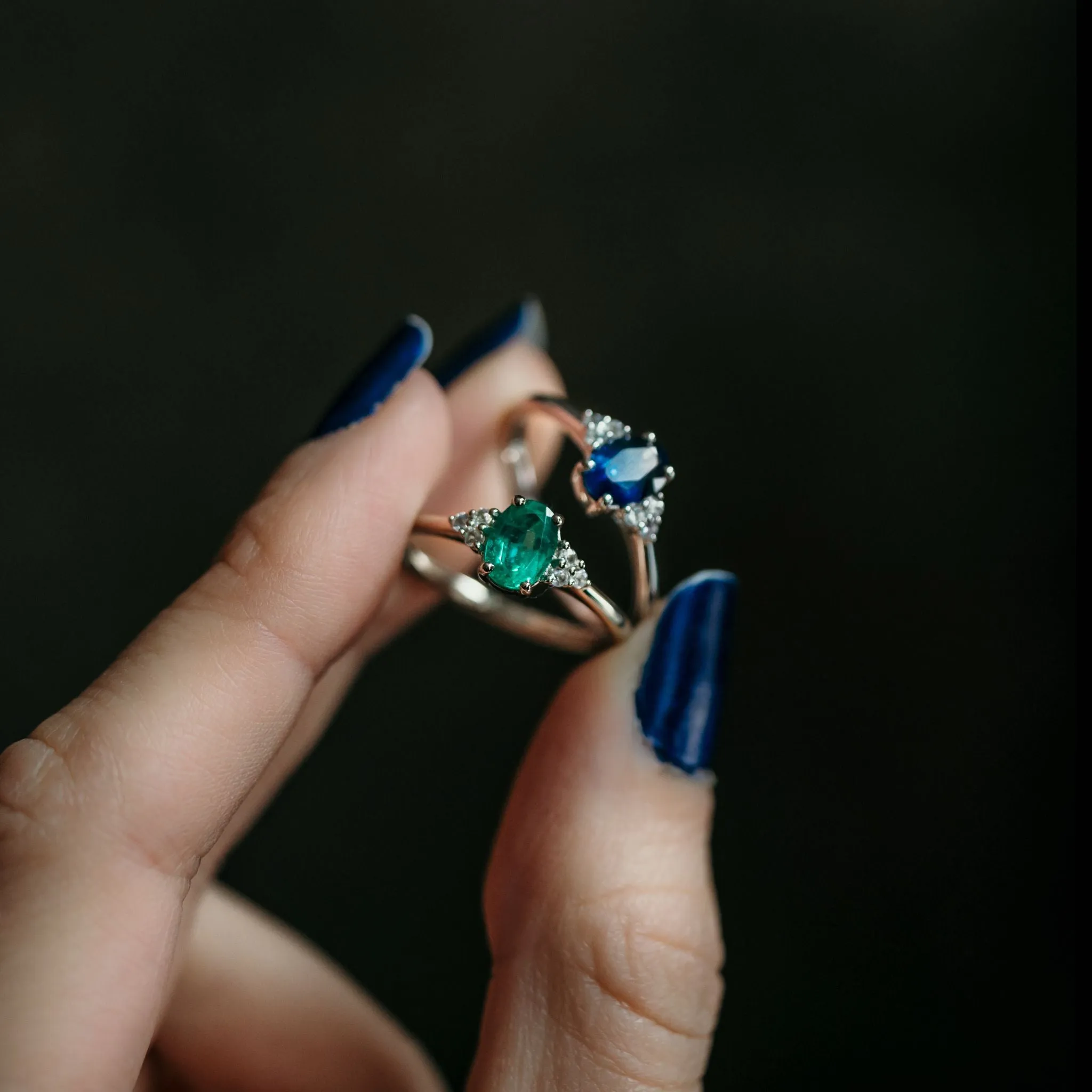Emerald Engagement Ring With Side Stones
