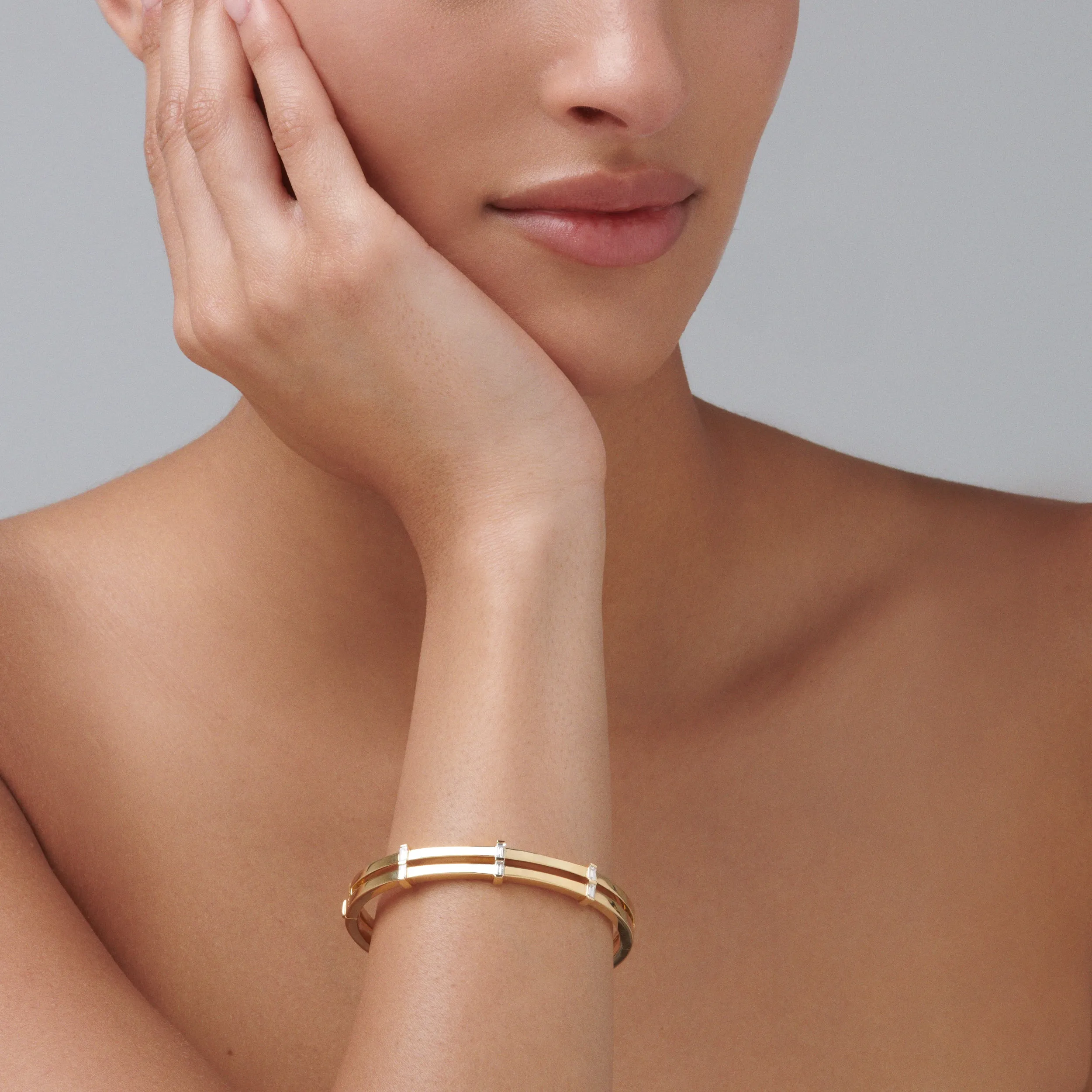 Lighthouse® Baguette Diamond Bangle | Yellow Gold