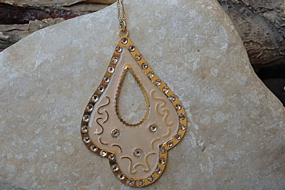 Pink and gold pendant