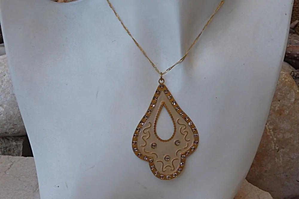 Pink and gold pendant