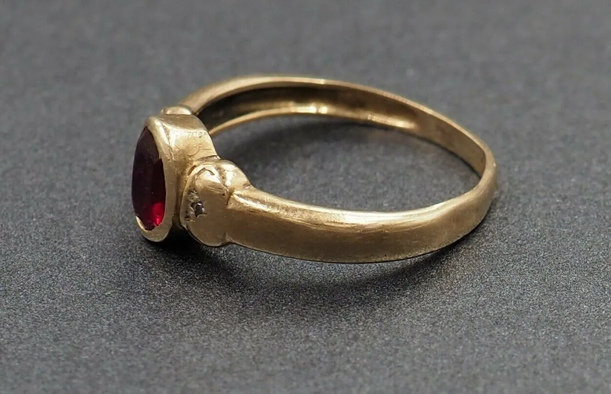 Ruby & Cubic Zirconia 9ct Yellow Gold Ring