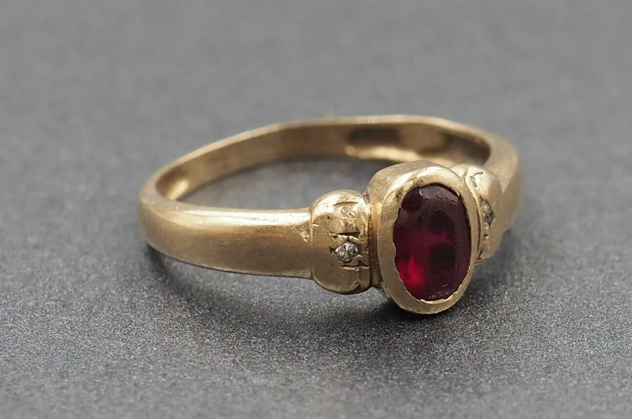 Ruby & Cubic Zirconia 9ct Yellow Gold Ring